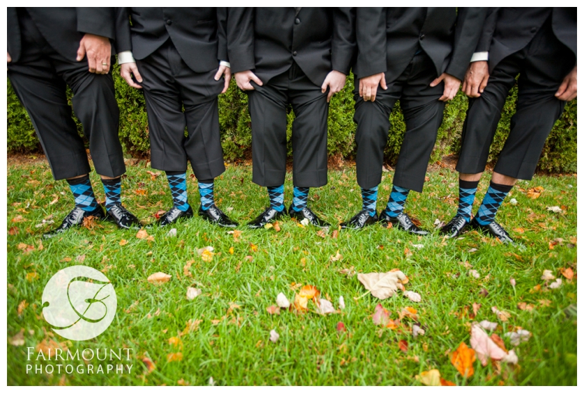 Groom and groomsmen show off their argyle socks
