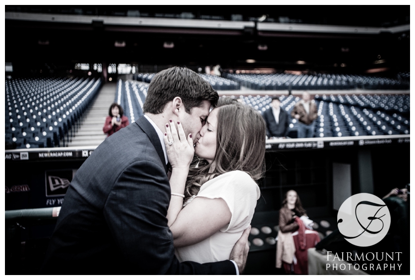 Couple kiss on field at Citizen's Bank Park