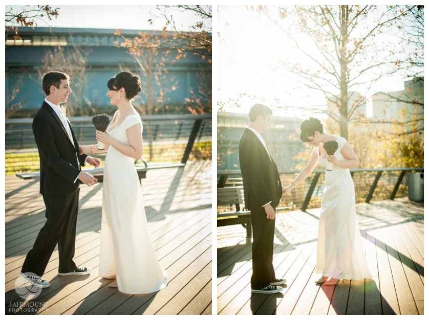 Fall First Look at sunset where bride in vintage dress greets groom on Race Street Pier on Delaware Ave in Philadelphia