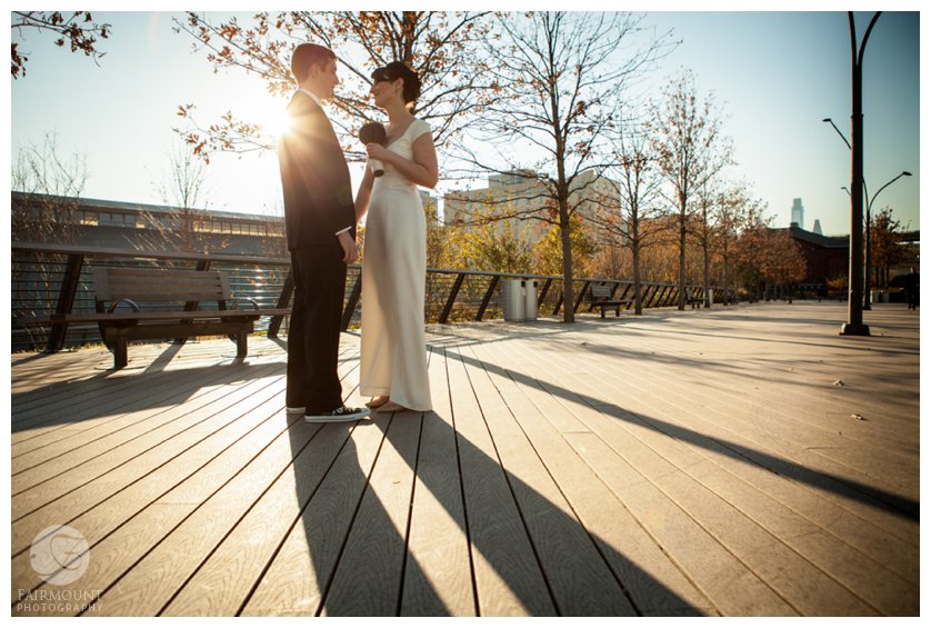 long shadows from bride and groom as they have their first look in Philly