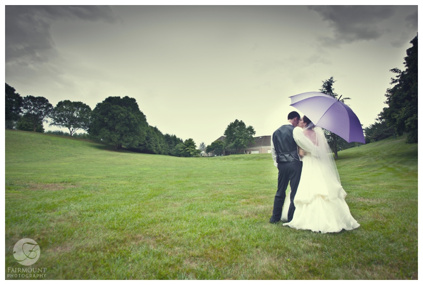 Bride and Groom Under Purple Umbrella