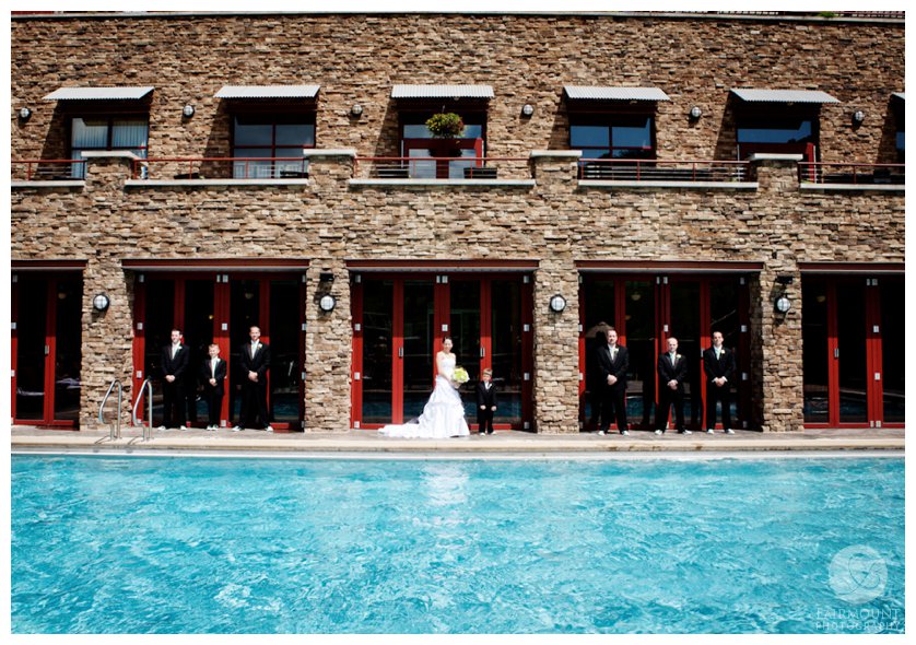 Bride and groomsmen by pool at Bear Creek Resort