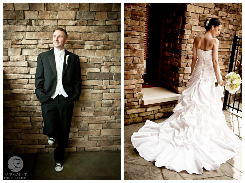 bride & groom in front of stone wall at Bear Creek
