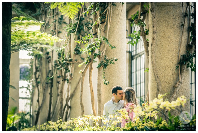 Couple kisses inside Longwood Gardens near Philadelphia, PA