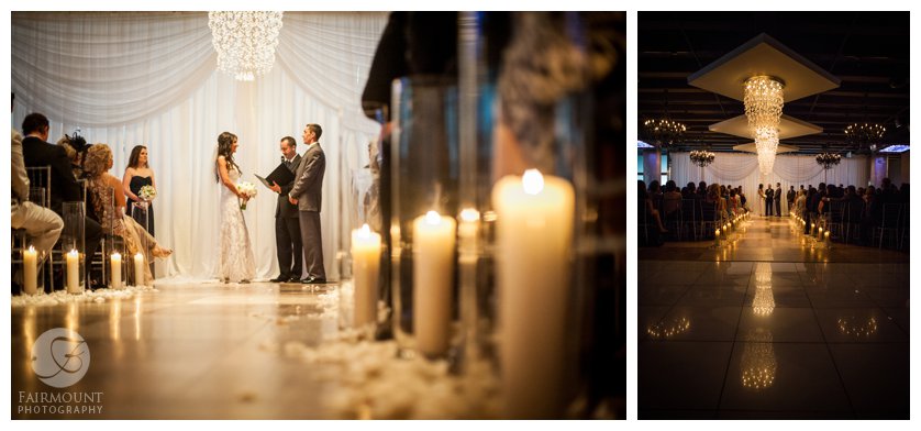 pillar candles and white rose petals line the aisle during a wedding at Tendenza in Philadelphia
