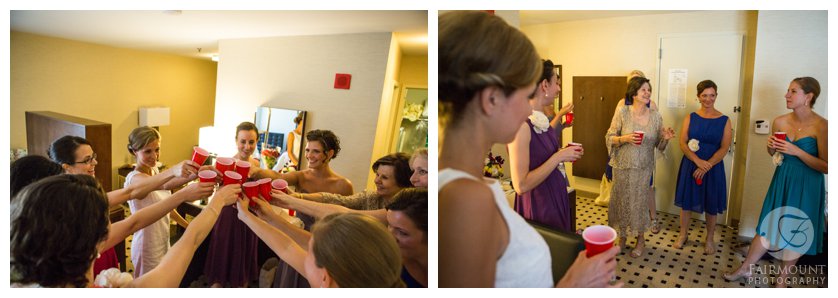 Hotel room toast at summer wedding in Philadelphia