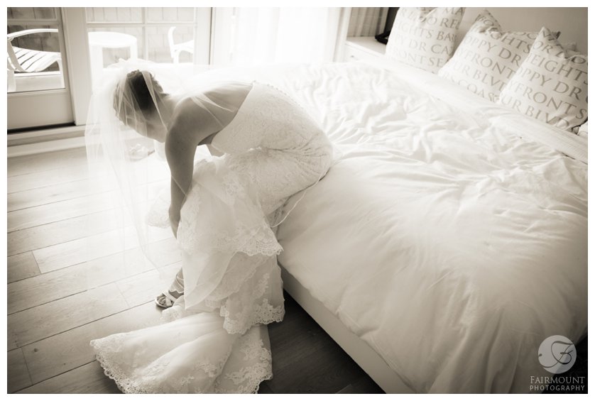 elegant black & white portrait of bride getting ready