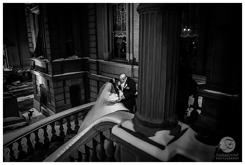 bride and groom on steps of the union league