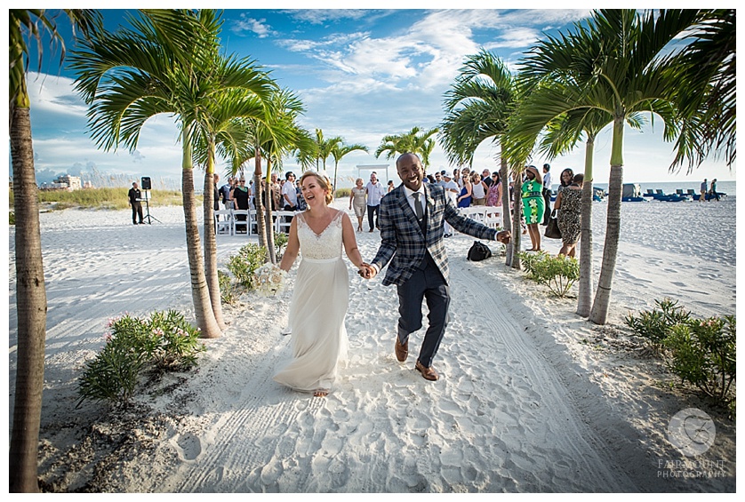 Bride and Groom dancing on beach