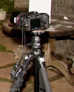 Detail of PocketWizard MultiMAX in relay mode with pre-trigger cable and PC cable for photobooth