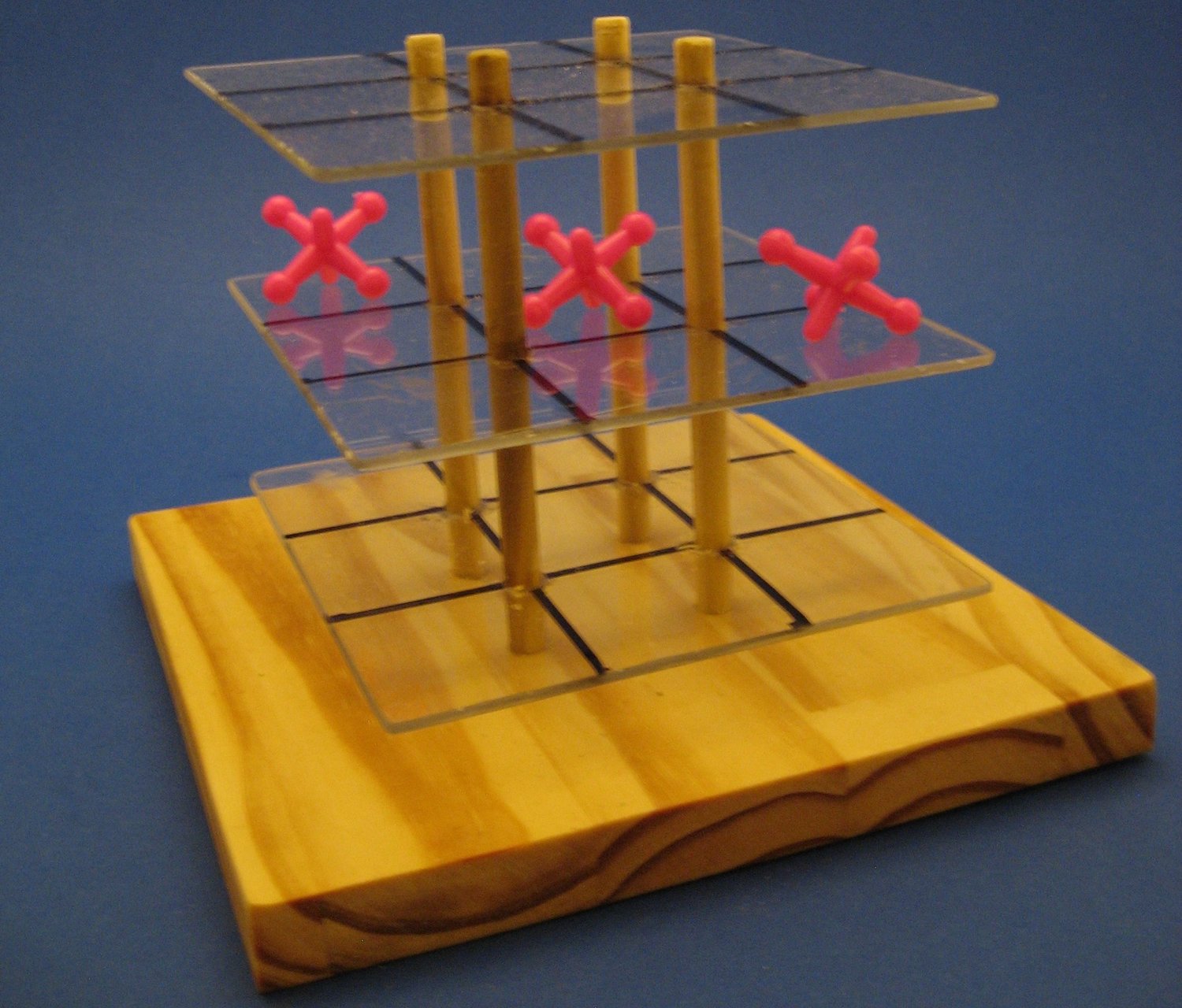 Three-dimensional tic-tac-toe can be played on three arrays of 3x3