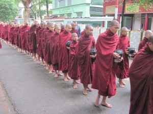 Mahagandhayan Monastery monks line up for lunch.