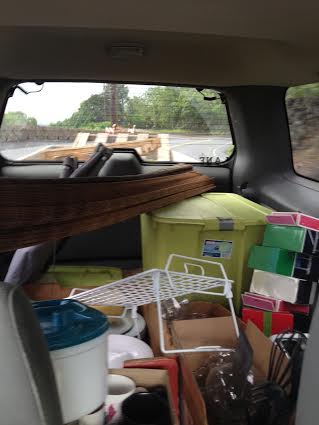                                                               This is the back of the jeep filled with our awesome dump-store finds. 