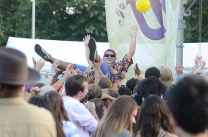  Photo Courtesy of University Relations. A student crowdsurfs during 2014 Fall fest.