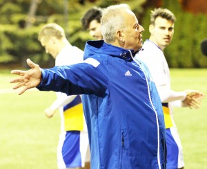 Cam Keough/The Chronicle  Coach Richard Nuttall instructs his team in the loss to JMU on Halloween night.