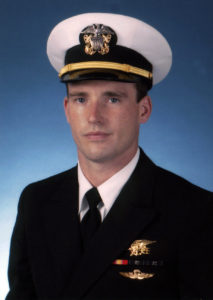 071001-N-0000X-001 Navy file photo of SEAL Lt. Michael P. Murphy, from Patchogue, N.Y. Murphy was killed by enemy forces during a reconnaissance mission, Operation Red Wing, June 28, 2005, while leading a four-man team tasked with finding a key Taliban leader in the mountainous terrain near Asadabad, Afghanistan. The team came under fire from a much larger enemy force with superior tactical position. Murphy knowingly left his position of cover to get a clear signal in order to communicate with his headquarters and was mortally wounded while exposing himself to enemy fire. While being shot and shot at, Murphy provided his units location and requested immediate support for his element. He returned to his cover position to continue the fight until finally succumbing to his wounds. U.S. Navy photo (RELEASED)