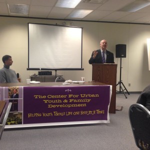 Guest speaker Kevin Phelps (left) and keynote speaker the Honorable Ulysses Boykin (at the podium).