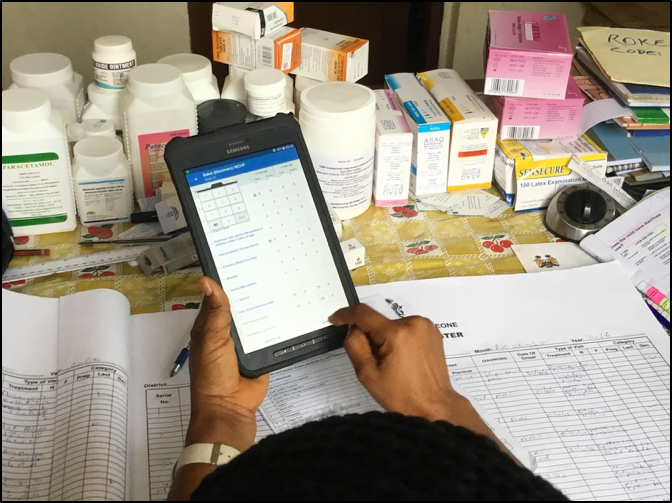 Healthcare worker utilizing eIDSR app