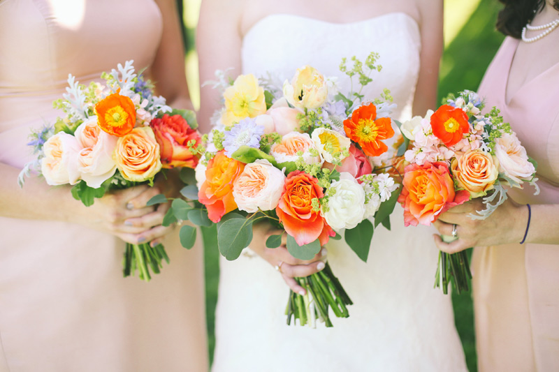 wedding party flowers in orange and peach