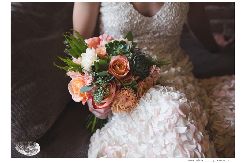 bride's bouquet in blush, peach and ivory with succulents