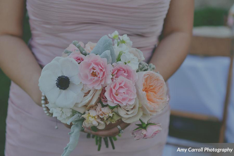 wedding flowers in blush peach and ivory at michigan farm wedding