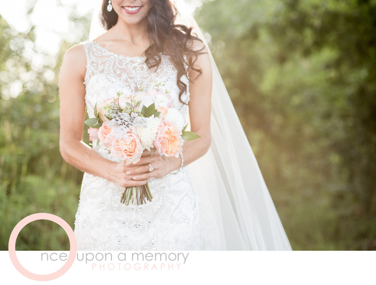 bride bouquet in peach and ivory garden roses