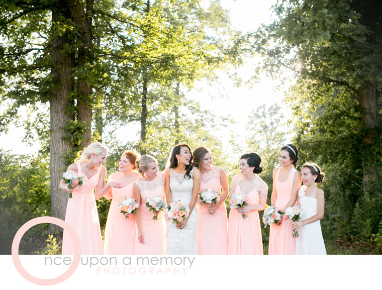 bridal party in peach and ivory