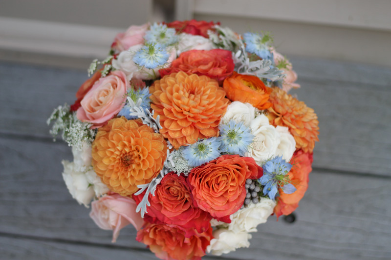 orange blush peach pink blue wedding bouquet