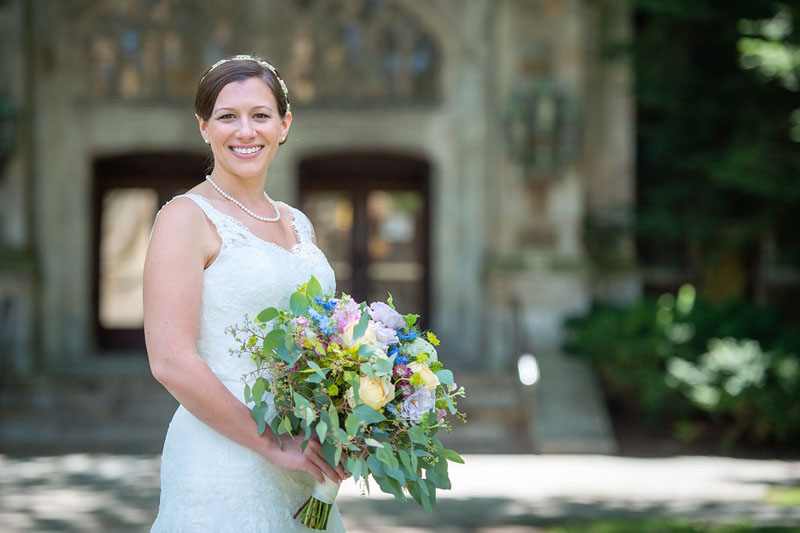 bride's bouquet in lavender, green, yellow, burgundy