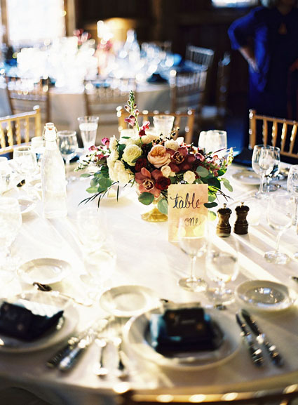 wedding reception centerpieces in gold compote dish