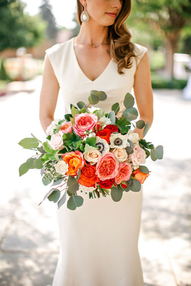 wedding bouquet in coral pink orange and white