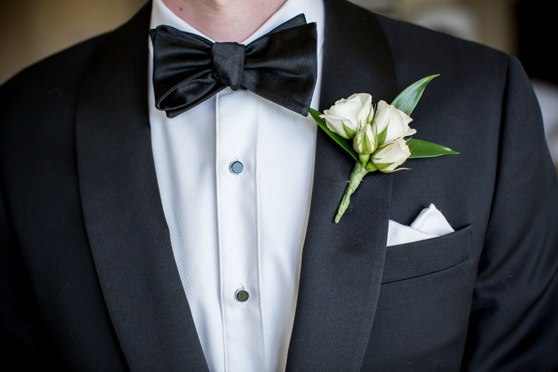 groom boutonniere in blush and ivory