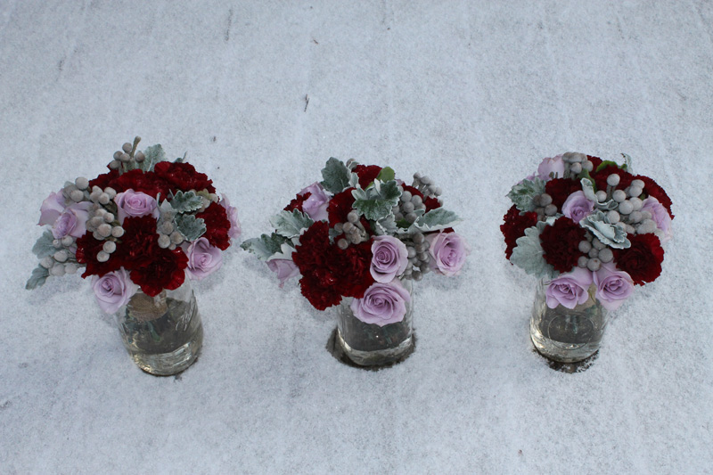 bridesmaid bouquets in lavender, silver, burgundy