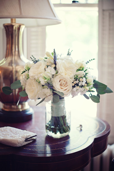 wedding flowers of ivory garden roses, lavender, and fresh herbs