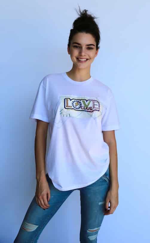 Kendall Jenner wears LOVE Club x Itchy Scratchy Patchy T-shirts Photo: Hugo Scott Styling: Katie Grand 