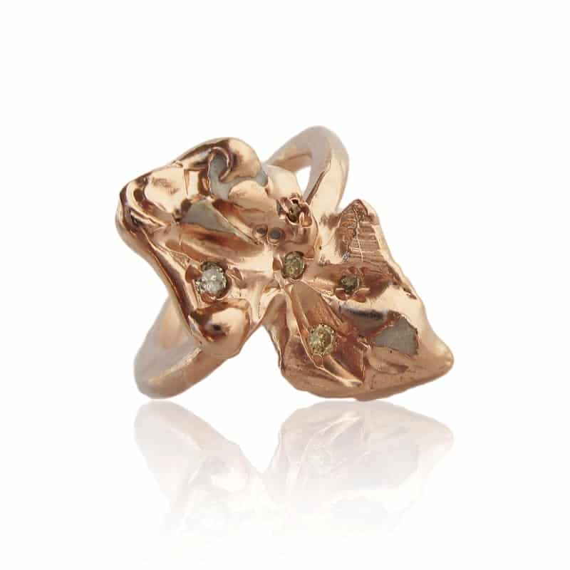 IMOGEN BELFIELD. 'Marpesia rose gold ring, set with white porcelain and 0.01 carat coloured diamonds, £1,360. www.lamaisoncouture.com