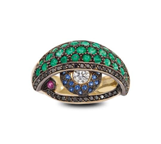 SOLANGE. Diamonds, Emeralds, Sapphires and Rubies in blackened 18ct yellow gold Eye ring, £POA. 