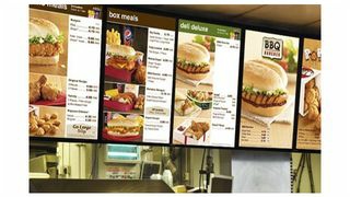 KFC_fast_food_menu_board.5480a6d41a136