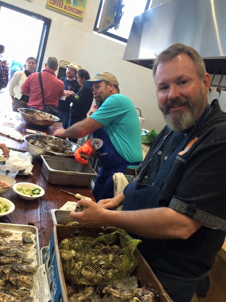 Slow Food Urban San Diego member, CHef Drew Deckman and Louisiana fishermen, Lance Nacio shucking oysters -- Baja Kumiai and Louisiana. Photo: S. Shoffler
