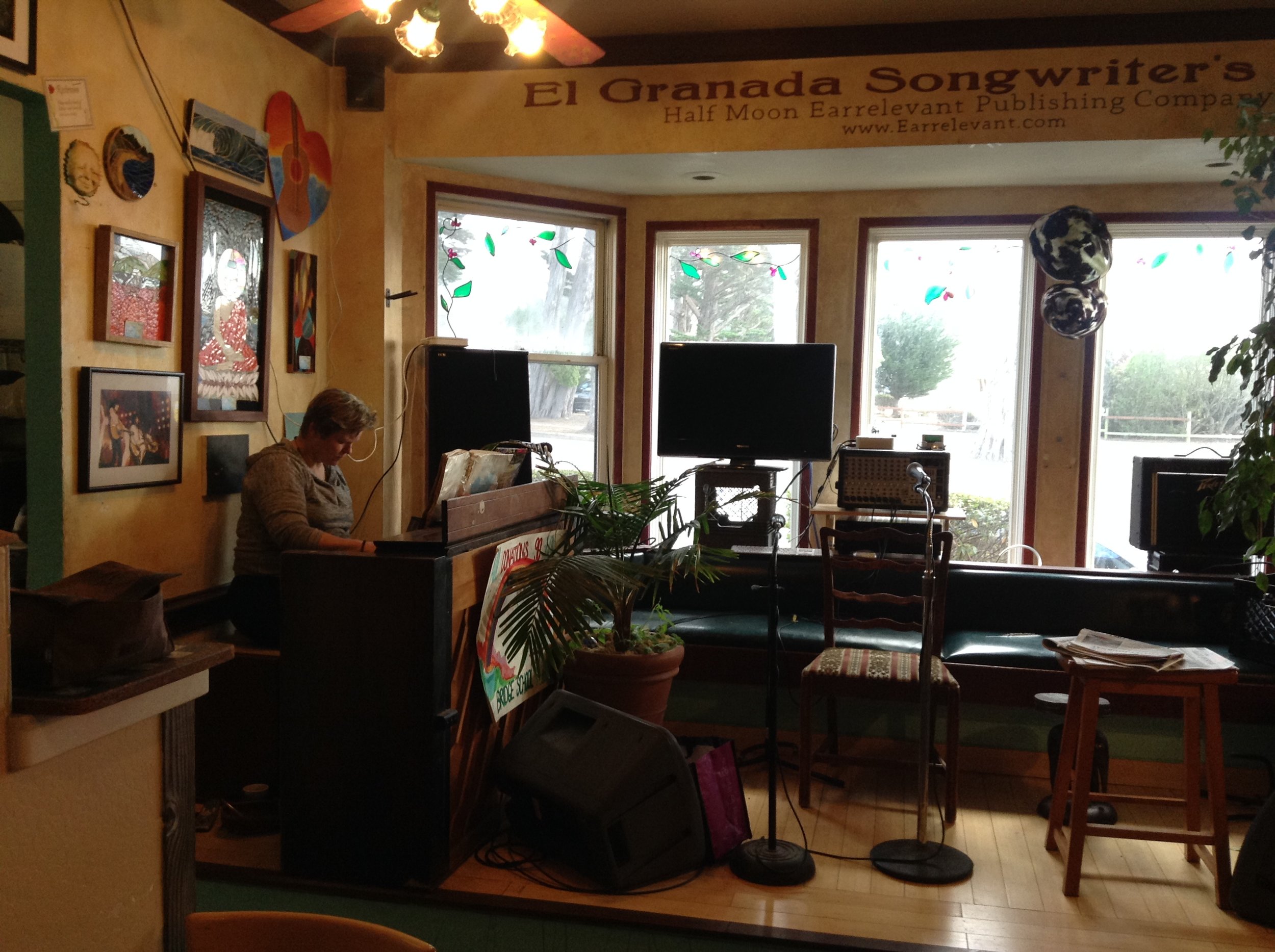 Shirley plays the piano at Cafe Classique, El Granada.