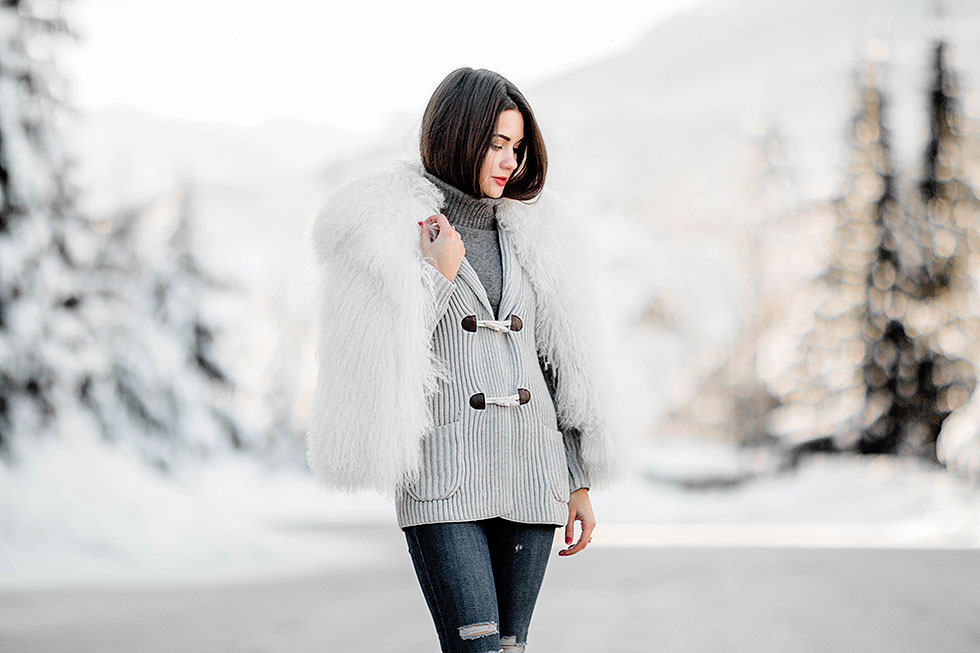 what to pack for the ultimate chic ski trip Tommy Hilfiger Toggle Cardigan and fur coat winter snow outfit whistler Canada