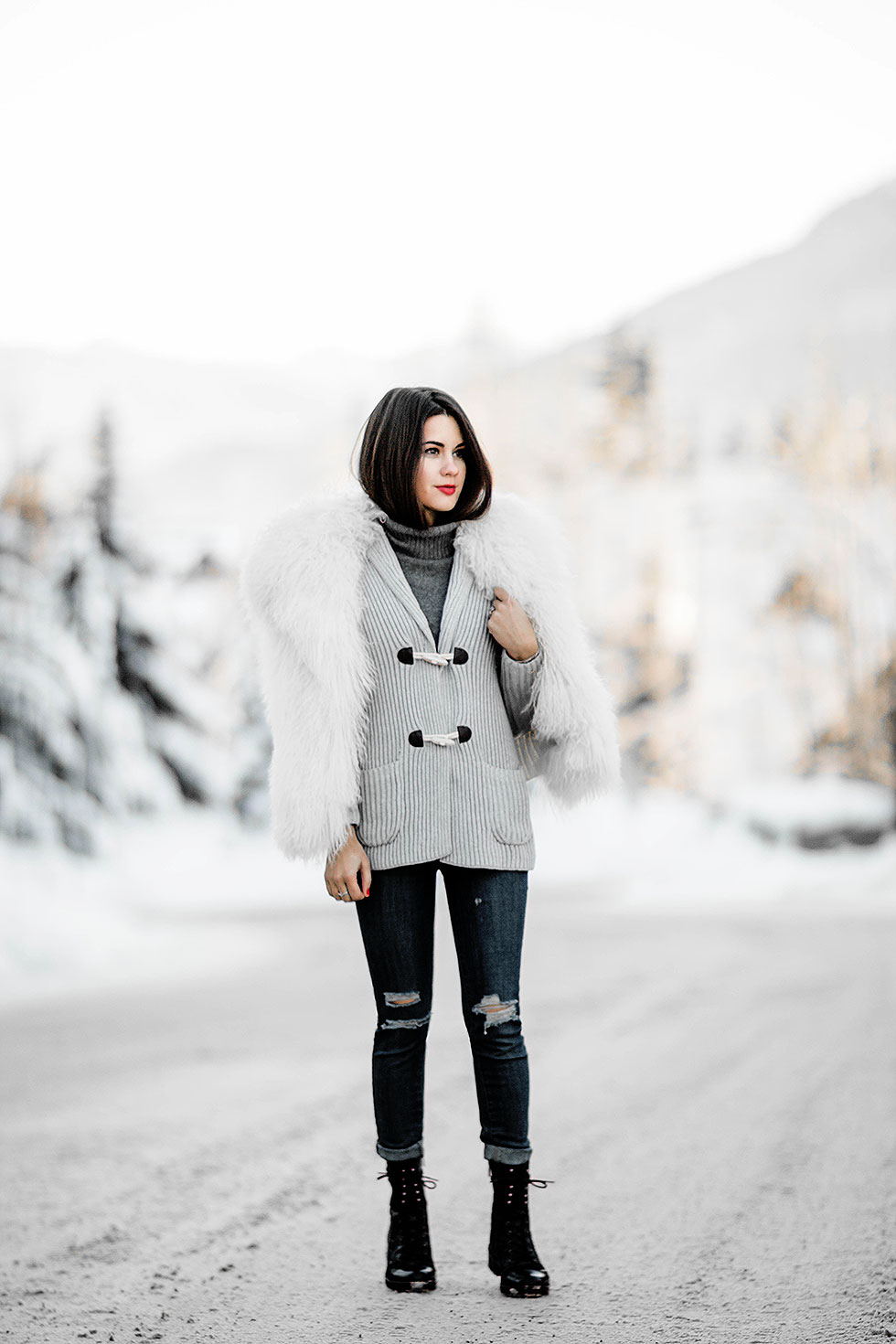 what to pack for the ultimate chic ski trip Tommy Hilfiger Toggle Cardigan and fur coat winter snow outfit whistler Canada