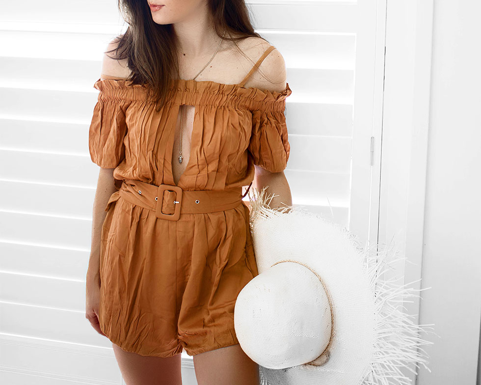 How to Pack for a Summer Beach Weekend --- yellow rust romper is a classic romper with an off-the-shoulder design, a slit chest and back, and belt that cinches around the waist