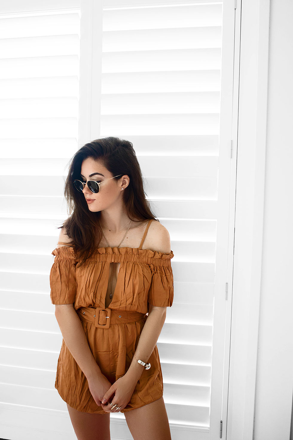 How to Pack for a Summer Beach Weekend --- yellow rust romper is a classic romper with an off-the-shoulder design, a slit chest and back, and belt that cinches around the waist