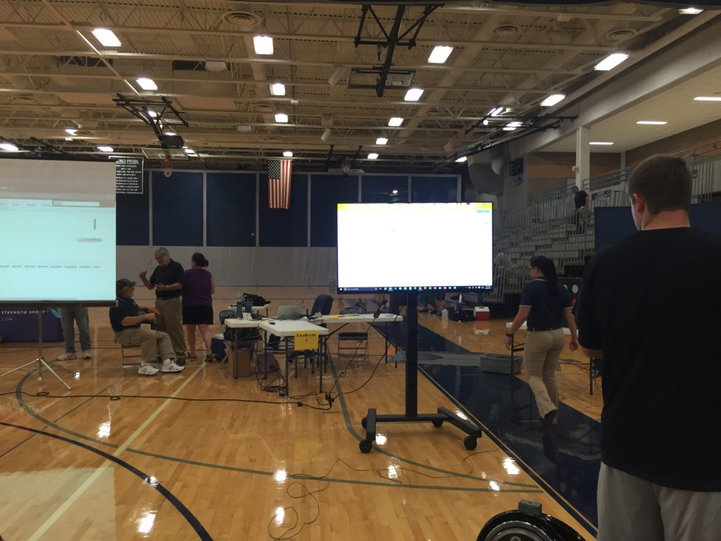 Picture of Champlin High School Gymnasium with a 60 inch TV with stand.