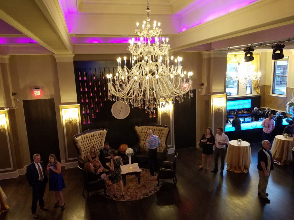 Interior Photo of Mansion at Uptown - Chandelier and Bar