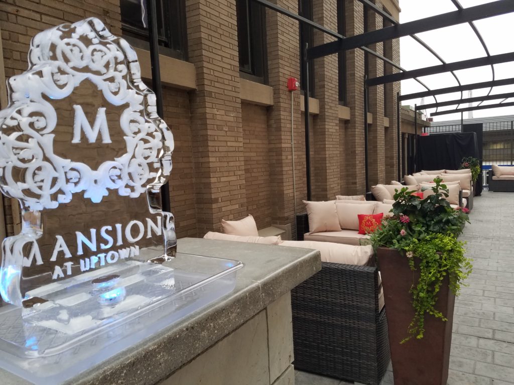 Picture of outdoor patio and ice sculpture at Mansion at Uptown