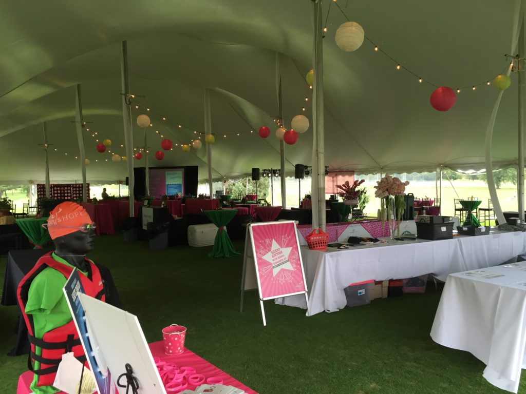 Picture of the interior of the tent at the 2016 Abbey's Hope Foundation event at the Braemer golf course. Picture shows AV for you 7.5x10 screen and multiple AV for You speakers