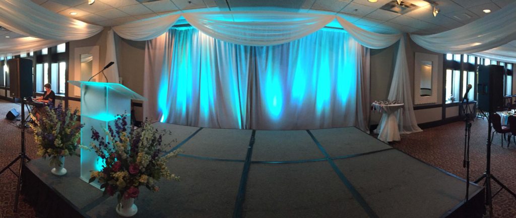 Picture of AV for You audio, lighting, and staging set-up for the North Hennepin Community College's Annual President's Circle Dinner