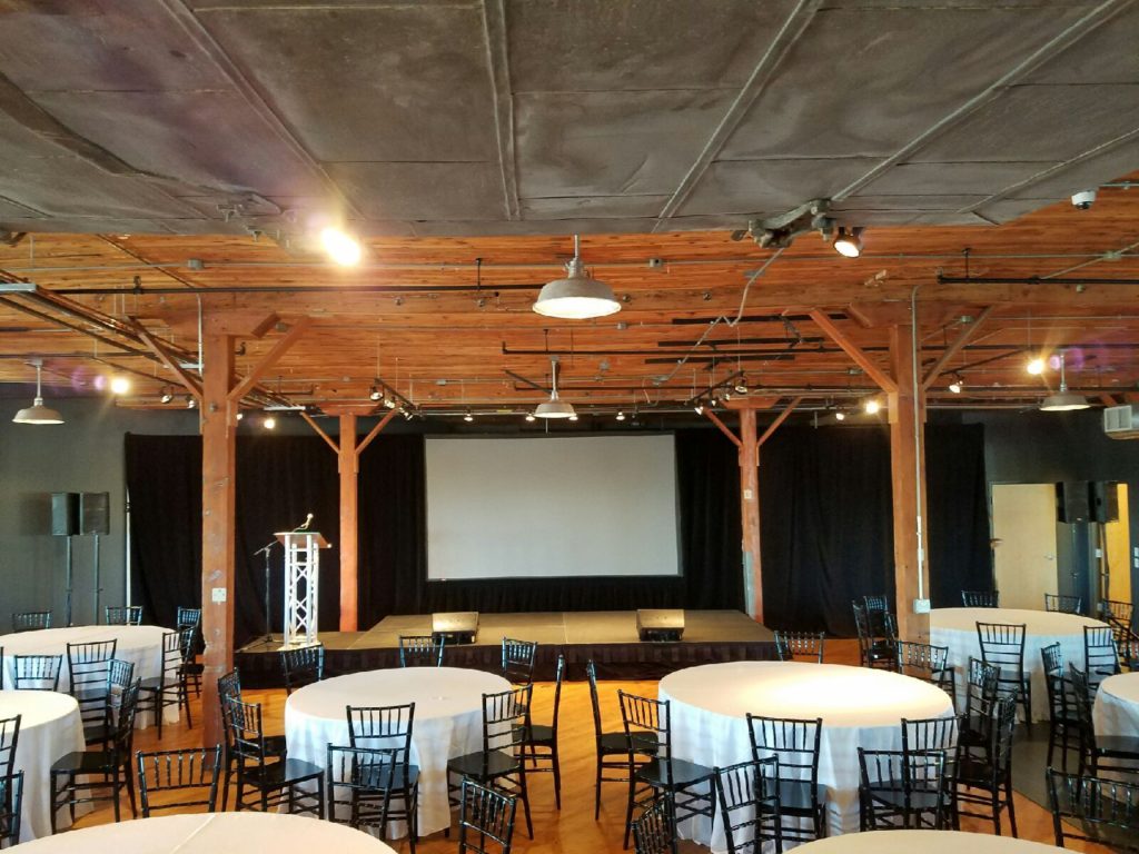Picture of AV for You audio, video, and event equipment set-up for the Pathways Fundraiser at the Solar Arts Building